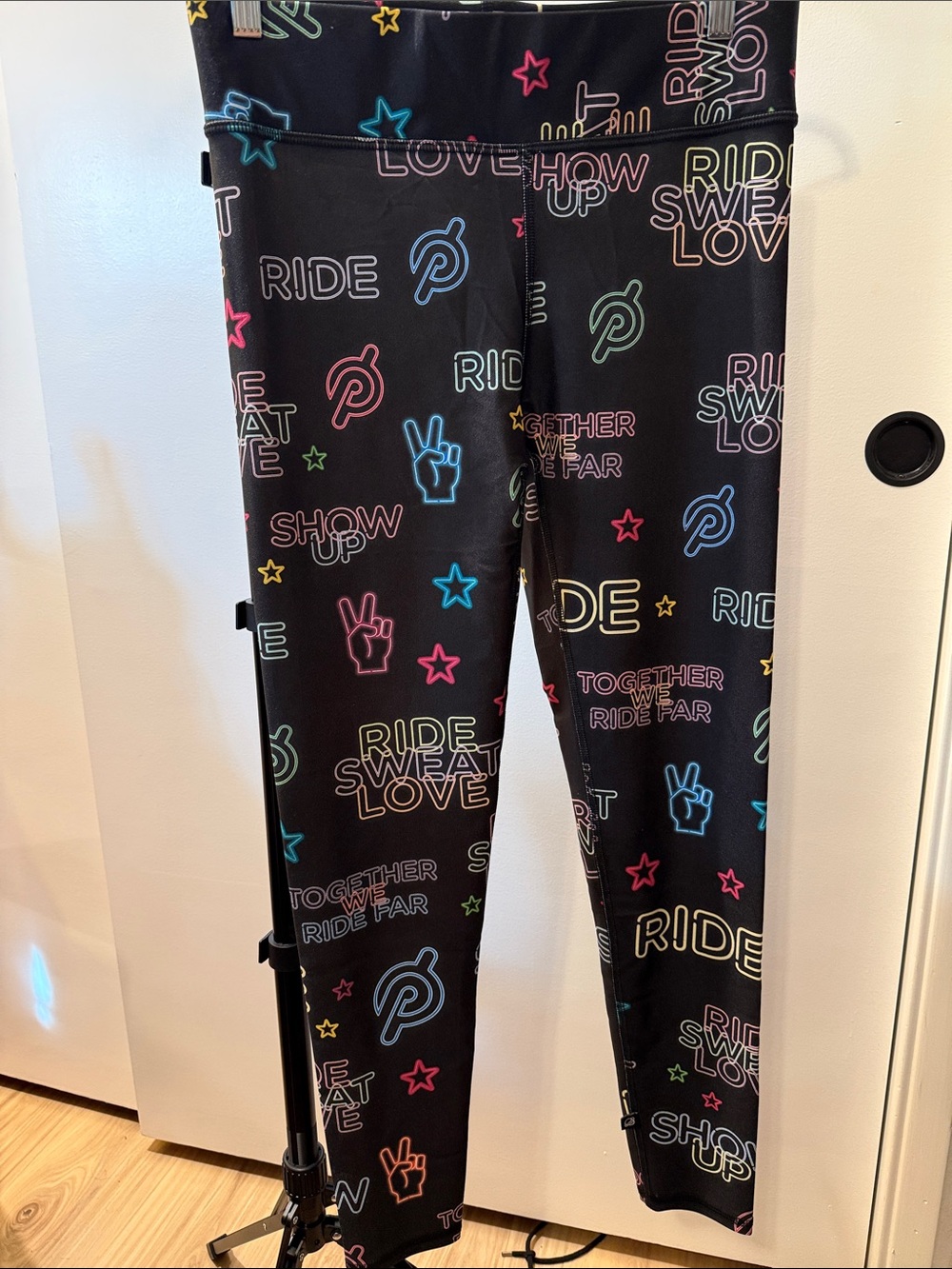 Peloton Black Leggings with Neon Logo & Star Print size XL new without tag